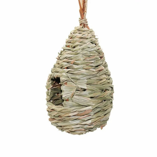 A natural straw bird's nest with a cosy, inviting design to provide a comfortable home for birds.