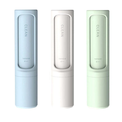 Rotating cylinder electrostatic pet hair remover brush in white, blue, green, and pink
