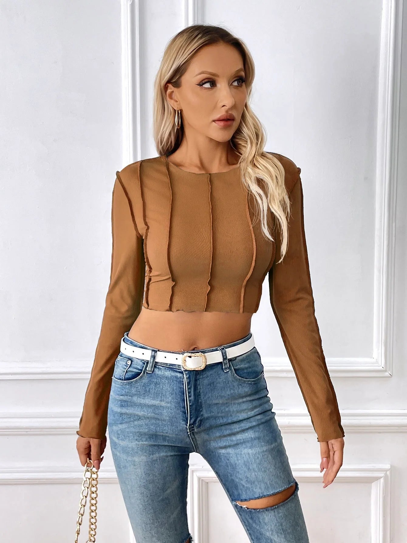 Y2K fashion slim long sleeve T-shirt with exposed stitching design in blue, black, and dark brown.