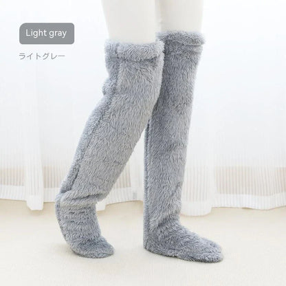 Cozy over-the-knee fuzzy socks in various colors, including brown, blue, dark gray, and pink purple