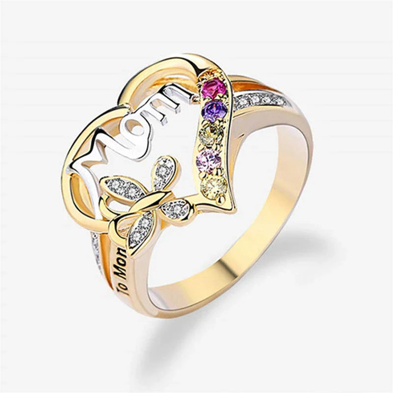 Elegant rhinestone heart-shaped ring in gold color with a dazzling array of multicolored rhinestones