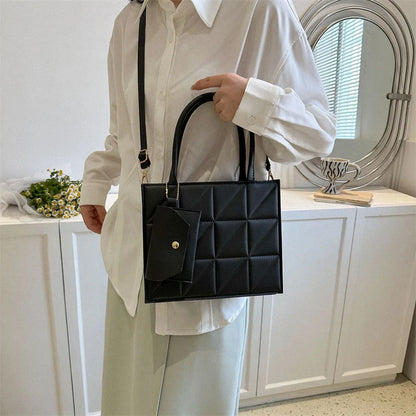 Chic plaid shoulder bag with wallet for women, available in black, white, blue, and green