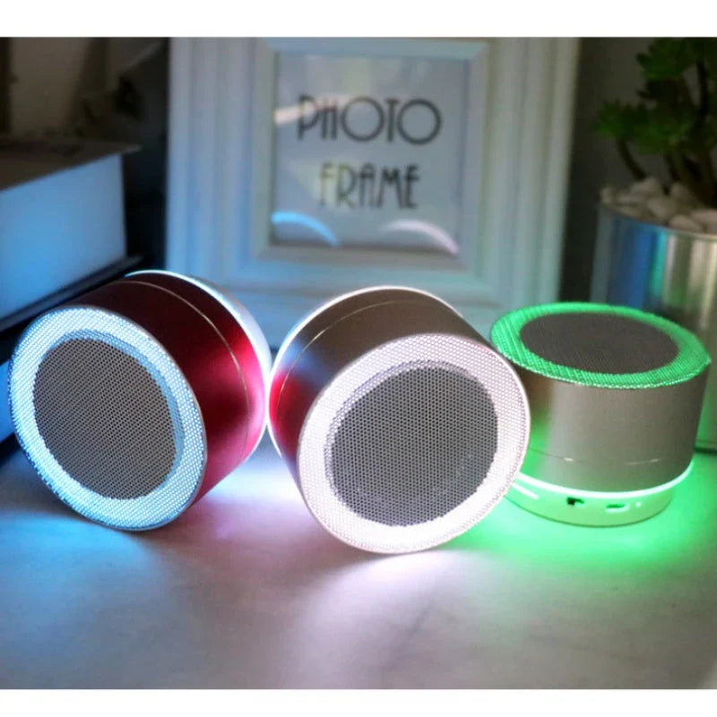 Portable Bluetooth speaker with colorful changing lights, high-quality audio, and durable design for on-the-go use