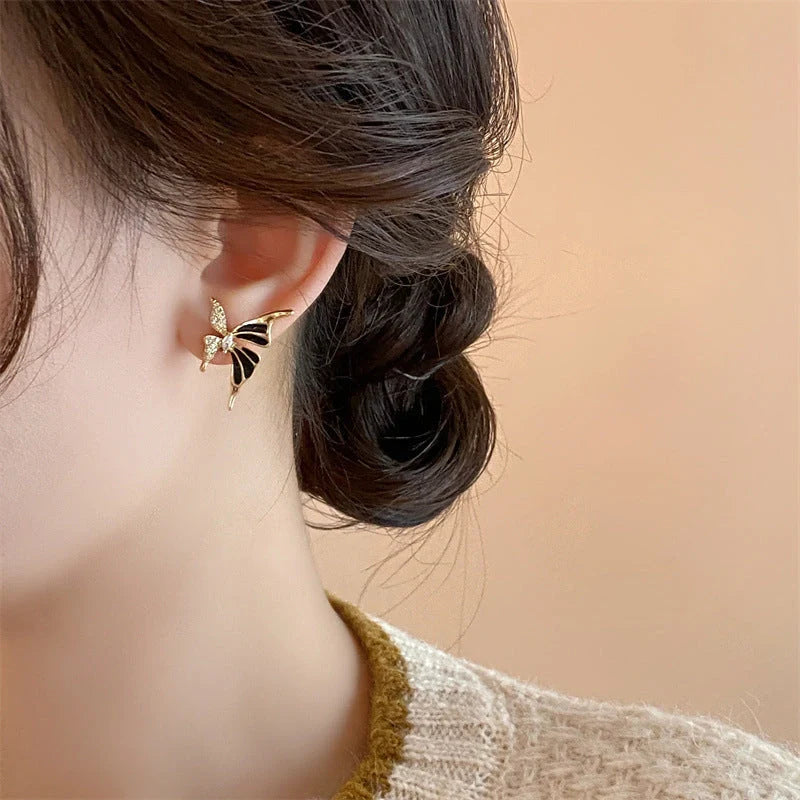 Rhinestone Dripped Butterflies Stud Earrings in alloy with diamond treatment