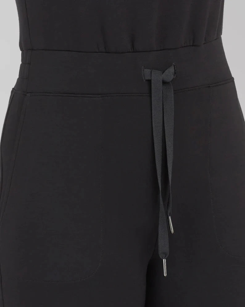 Women's lace-up jumpsuit pants in polyester, sleeveless design, available in multiple colors and sizes