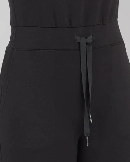 Women's lace-up jumpsuit pants in polyester, sleeveless design, available in multiple colors and sizes