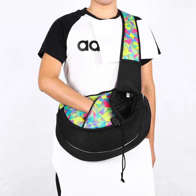 Versatile pet carrier bag in various colors, featuring adjustable drawstring closure and zipper-protected bottom for secure and comfortable pet transportation.