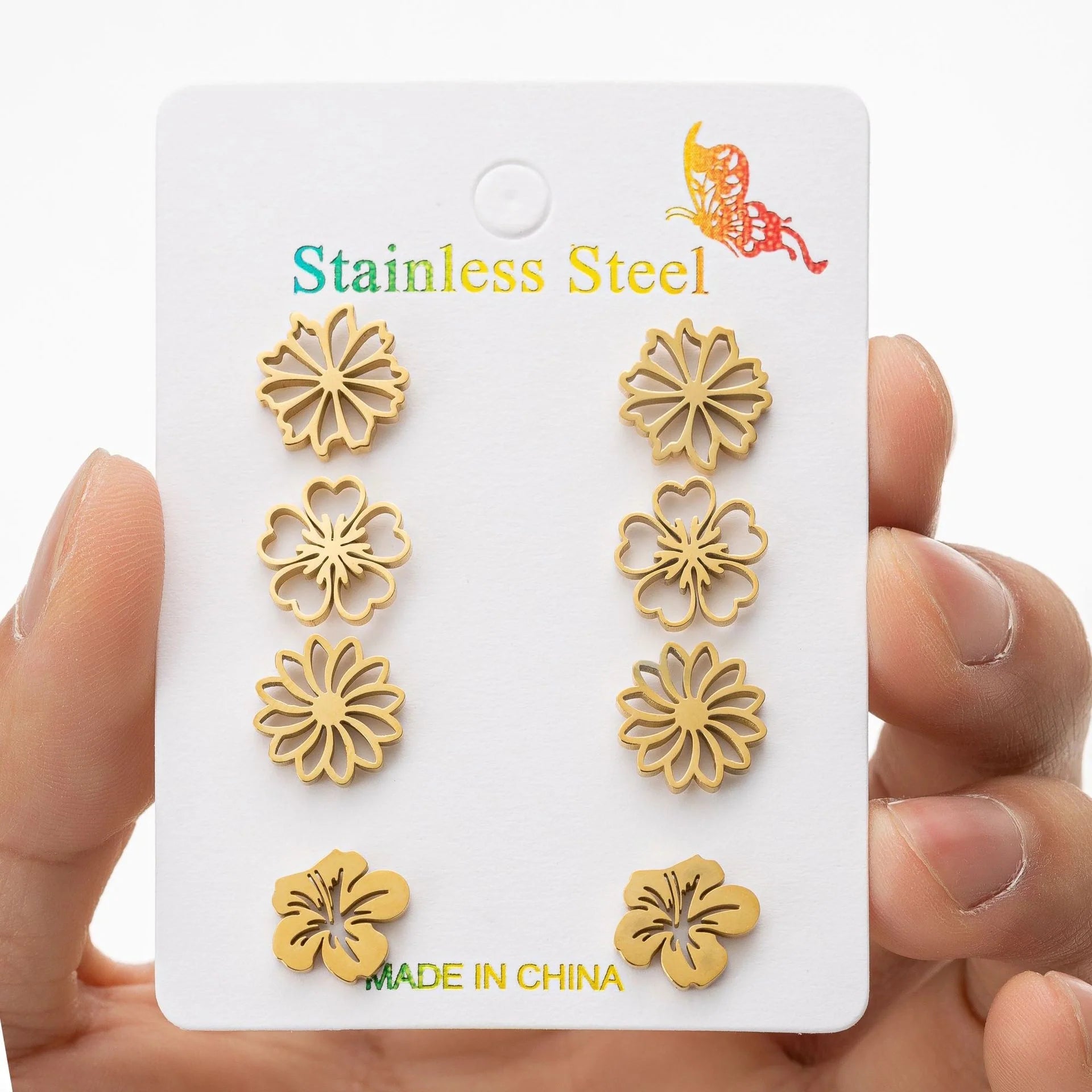 Fashion simulation stud earrings in gold, steel, rose gold, and black