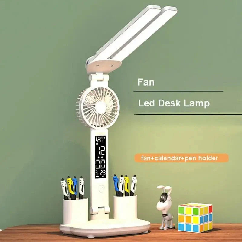 Foldable LED desk lamp with fan, thermometer, and pen holder on a tidy desk
