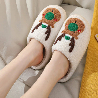 Cozy elk-themed slippers in a variety of festive colors, featuring a plush suede upper and supportive EVA sole for maximum comfort and warmth.