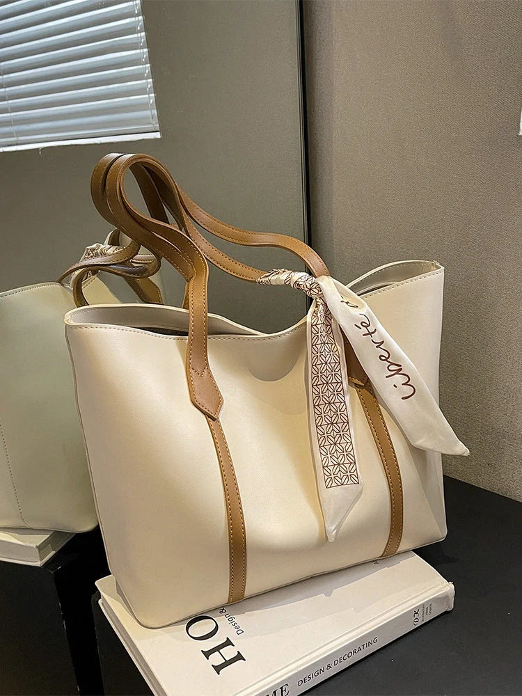 Stylish large capacity tote bag in various colours, perfect for fashion and functionality