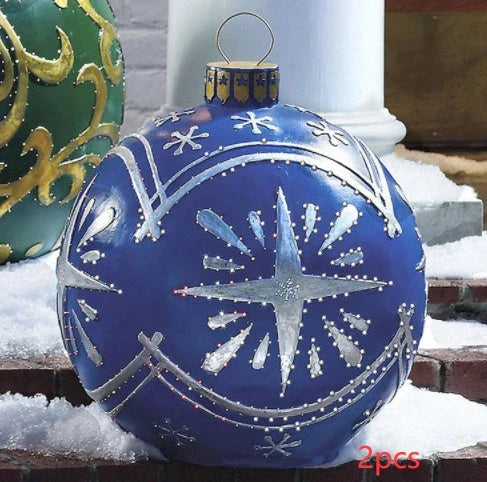 Inflatable Christmas baubles in various festive designs for outdoor holiday decoration