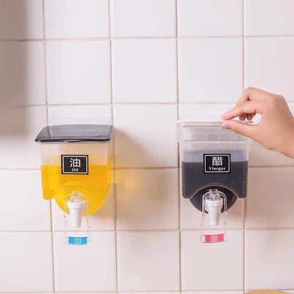 Wall-mounted condiment bottles in white and black, featuring press handle for easy pouring