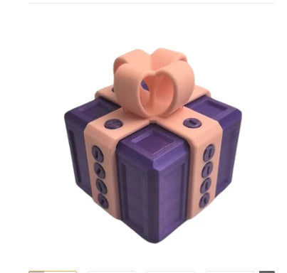 Clever Gag Gift Box - Unique 3D printed design in various colors with a humorous "trouble" concept for prank gifts and creative holiday presents