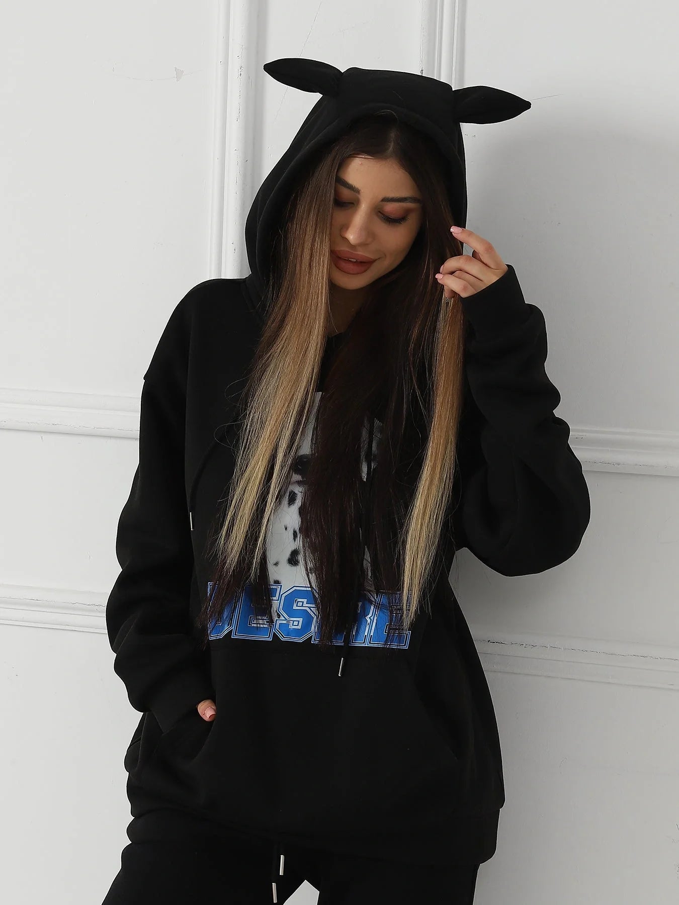 Stylish women's printed long sleeve sweatshirt in black, white, and grey