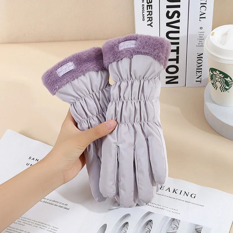 Cosy winter gloves with touch screen capability and fleece lining, available in various stylish colour options