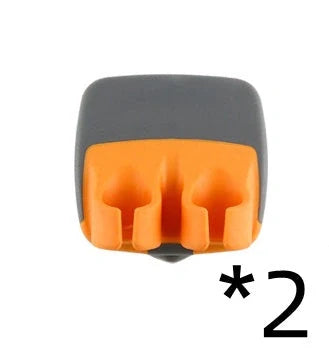 Two-finger peeler with ergonomic grip and stainless steel blade