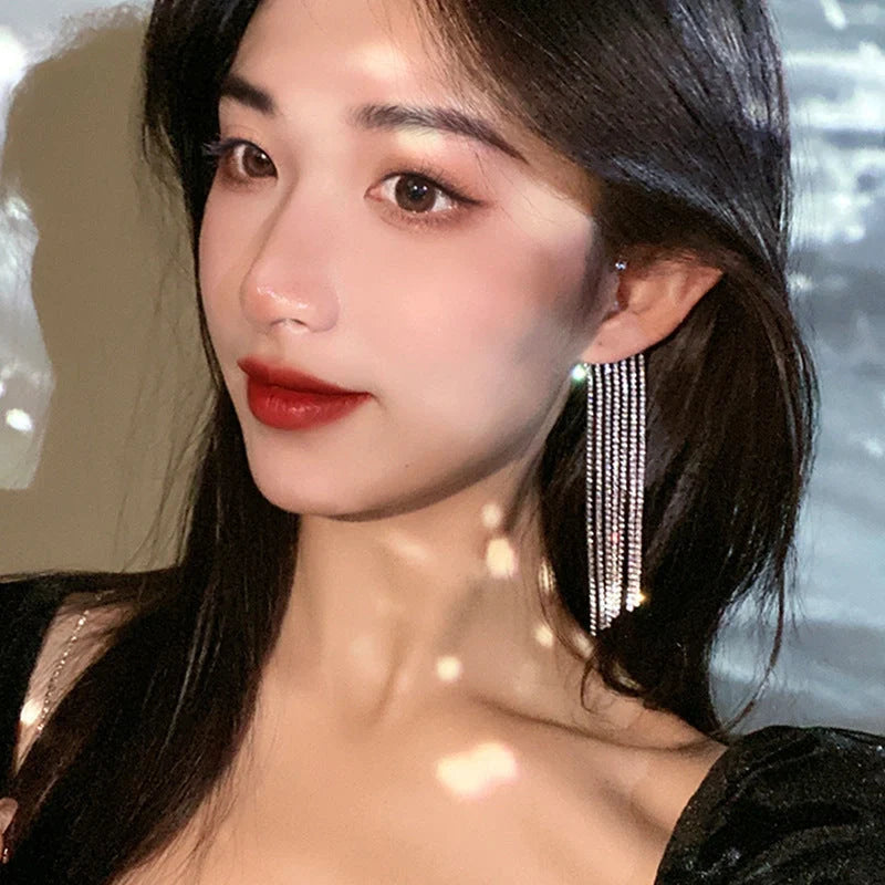 Long geometric tassel earrings with 14K real gold plating, available in gold and silver finishes