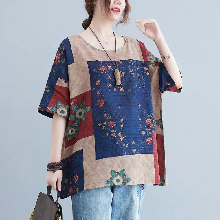 Stylish loose-fit floral print t-shirt in greyish purple, green, and navy blue colours