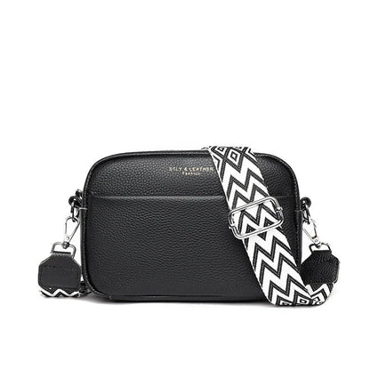 A fashionable crossbody bag with a rhombus embroidered strap, available in multiple colors including black, beige, green, blue, and khaki.