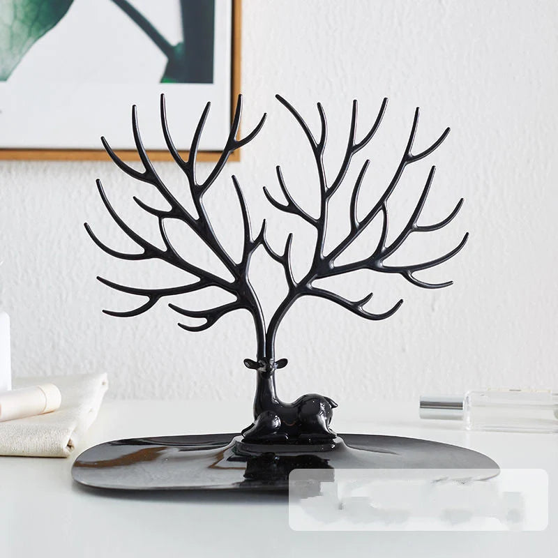 Deer Antler Jewelry Stand in white and black, displaying necklaces and earrings