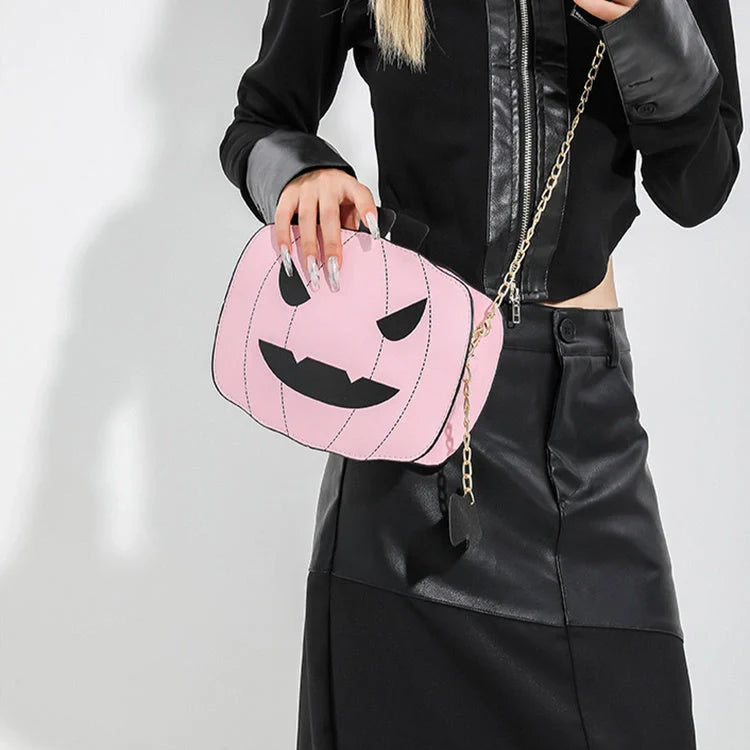Enchanting Halloween pumpkin-themed shoulder bag in various colours, featuring an adjustable chain strap and trendy urban style