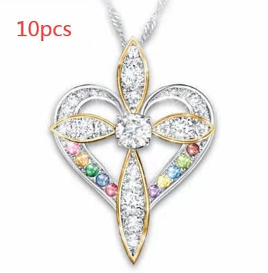 Elegant heart-shaped cross pendant necklace with adjustable chain, perfect for unisex wear.