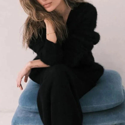 A stylish loose knit cardigan in a variety of colors, featuring a v-neck design and single-breasted closure for a flattering, relaxed fit.