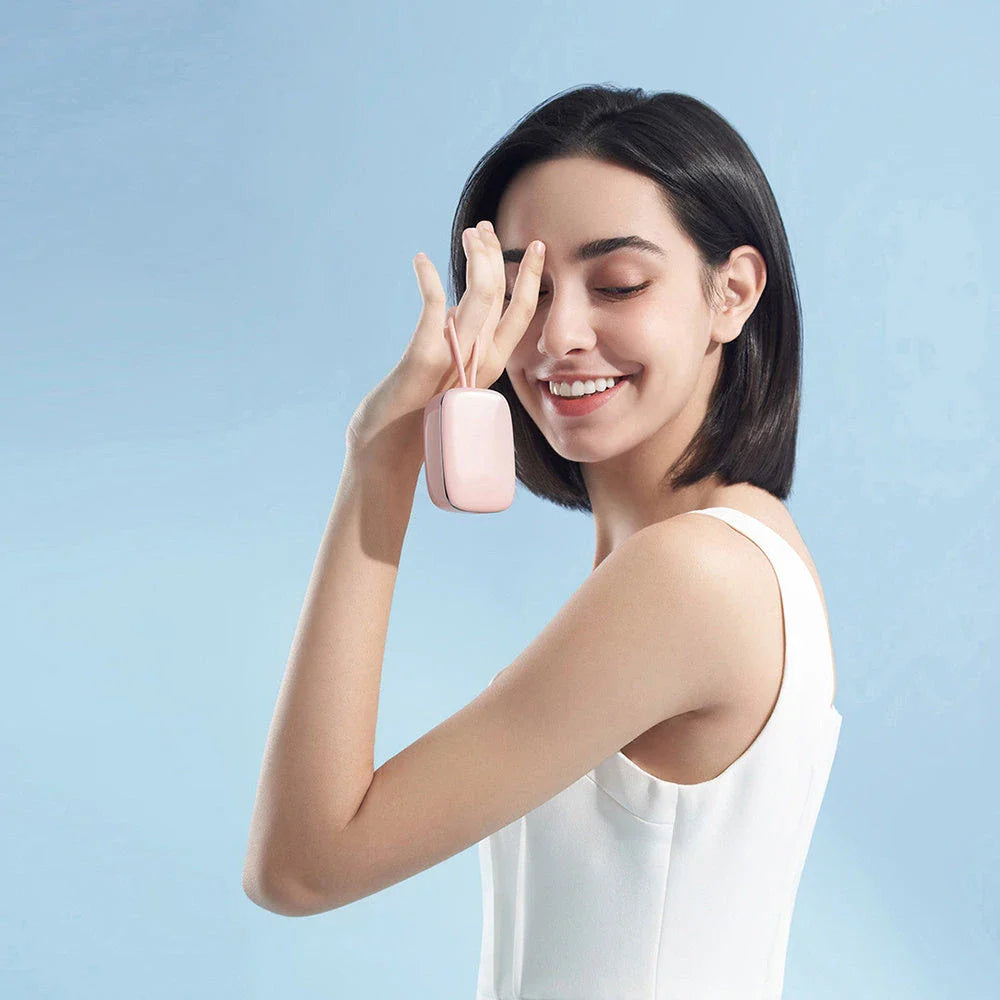 Premium UV sterilising electric toothbrush holder in green, pink, and white colours with built-in drying fan for sanitised and dry toothbrushes