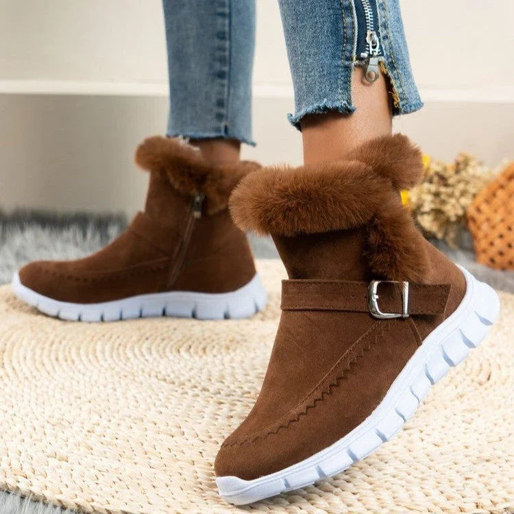 Cozy plush ankle boots in various colors with buckle detail and soft artificial fur lining