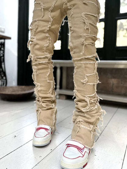 Stylish patched jeans with tight fit and stacked leg design in a variety of fashionable colors