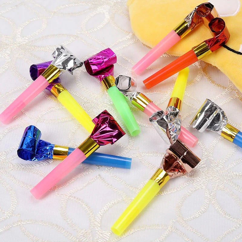 Colourful dragon-themed party favours made of high-quality plastic, including sticks and hammers in a variety of vibrant hues