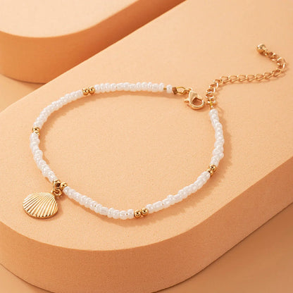 Adjustable bohemian style shell anklet with conch charm for women
