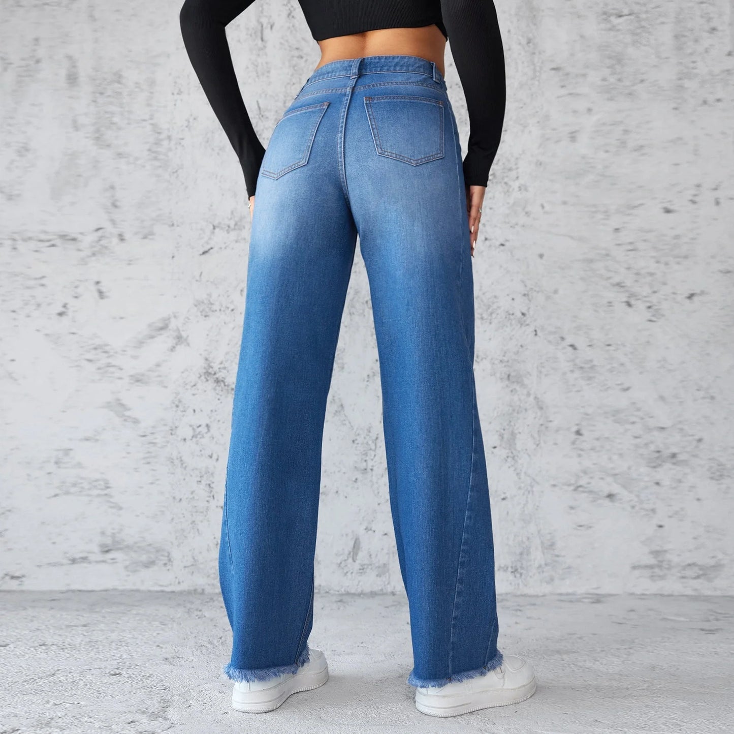 Straight wide-leg denim jeans in blue, featuring a unique collage design and high-waist fit for a stylish casual look
