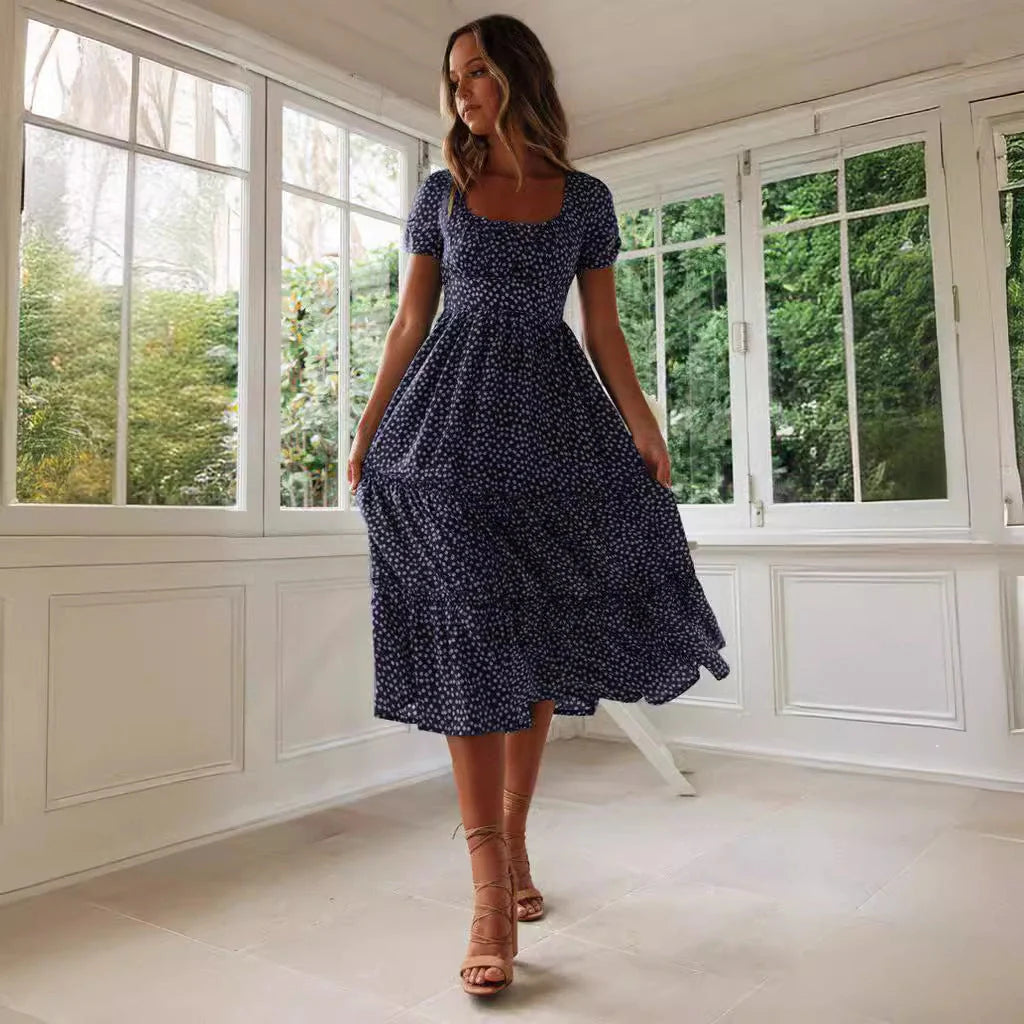 Elegant floral puff sleeve midi dress in various colours and patterns