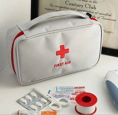 Large empty first aid kit in red, made from durable 600D Oxford cloth for outdoor and travel use