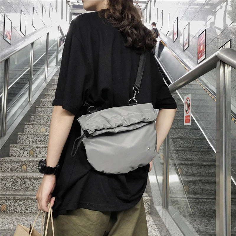 Stylish nylon drawstring waist bag with diagonal design, adjustable fit, and practical storage compartments