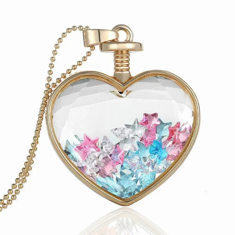 Elegant glass-encased dried flower pendant necklace with bead chain, showcasing a variety of preserved floral arrangements.