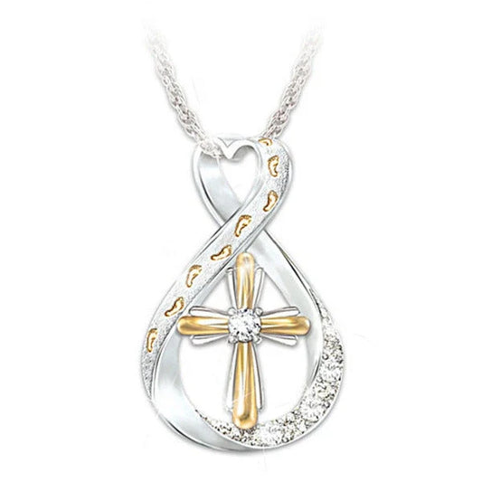 Elegant two-tone cross pendant with diamond-like accent, versatile and durable alloy design for everyday or special occasions.