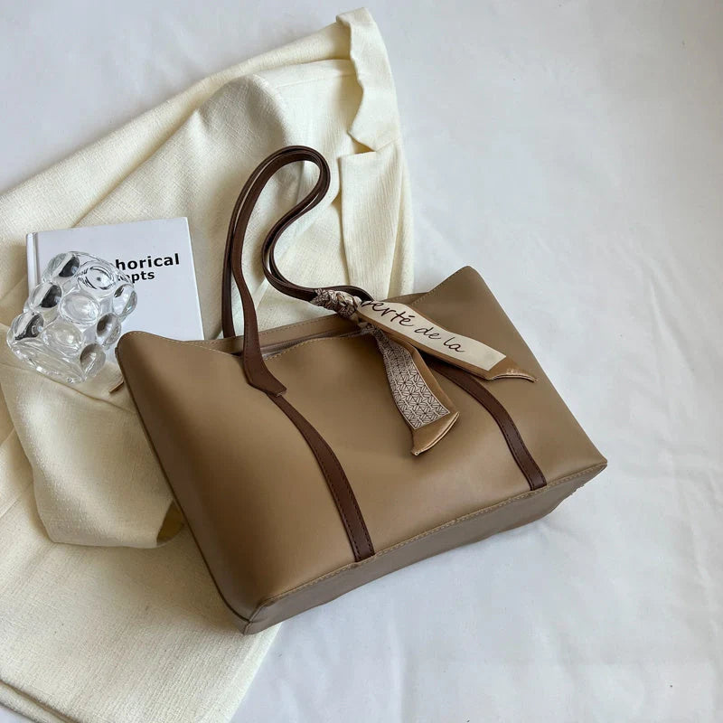Stylish large capacity tote bag in various colours, perfect for fashion and functionality