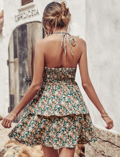 Stylish backless halter dress in various colors, featuring a ruffled A-line silhouette and comfortable polyester fabric for summer fashion