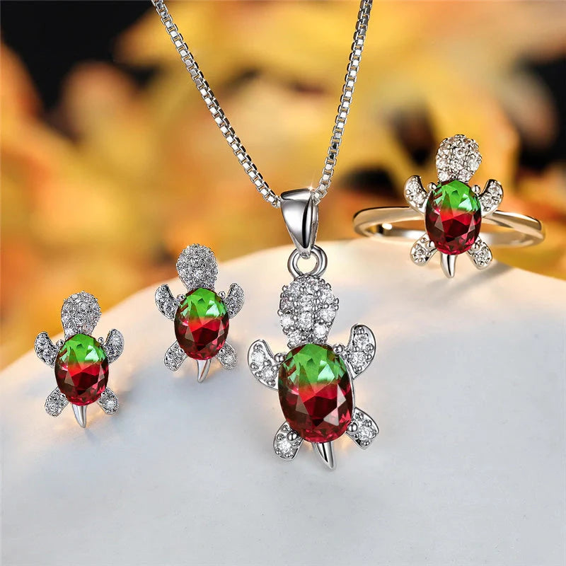 Stylish turtle pendant necklace with vibrant rainbow stones, perfect for women and children.