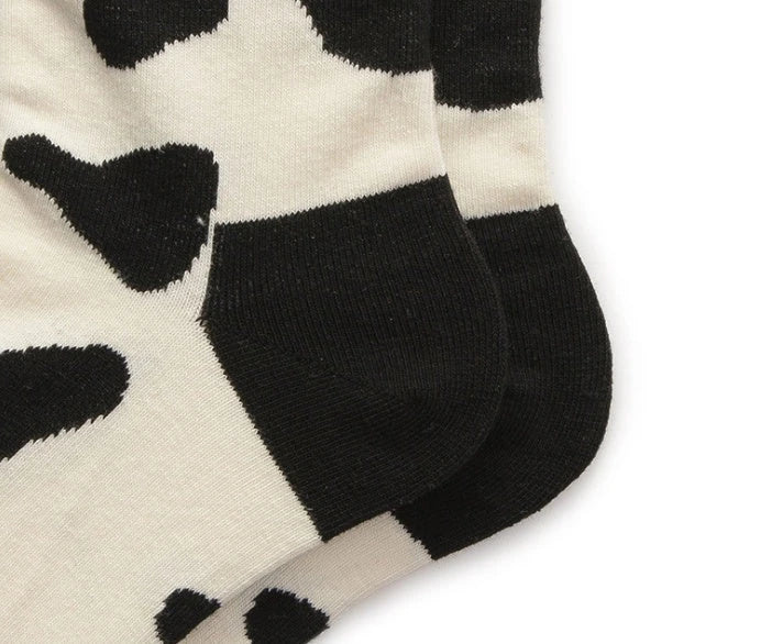 Stylish Dalmatian-inspired cotton crew socks with a premium blend of polyester, spandex, and cotton for all-day comfort and flexibility.