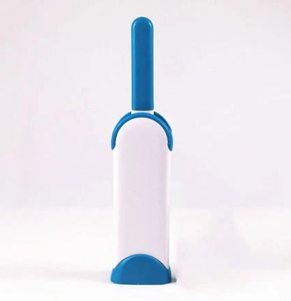 A reusable pet hair remover comb with a self-cleaning base, perfect for removing fur and lint from sofas, chairs, and other upholstery.