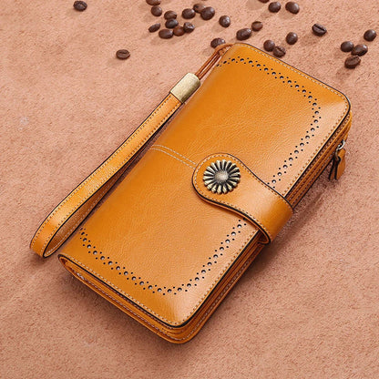 Premium leather wallet for women with zipper closure, card slots, and stylish design