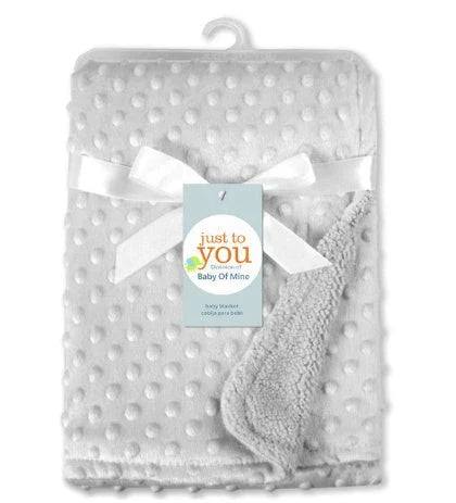 Premium plush baby blanket in various colours, perfect for swaddling, strolling, and creating a cosy nursery environment