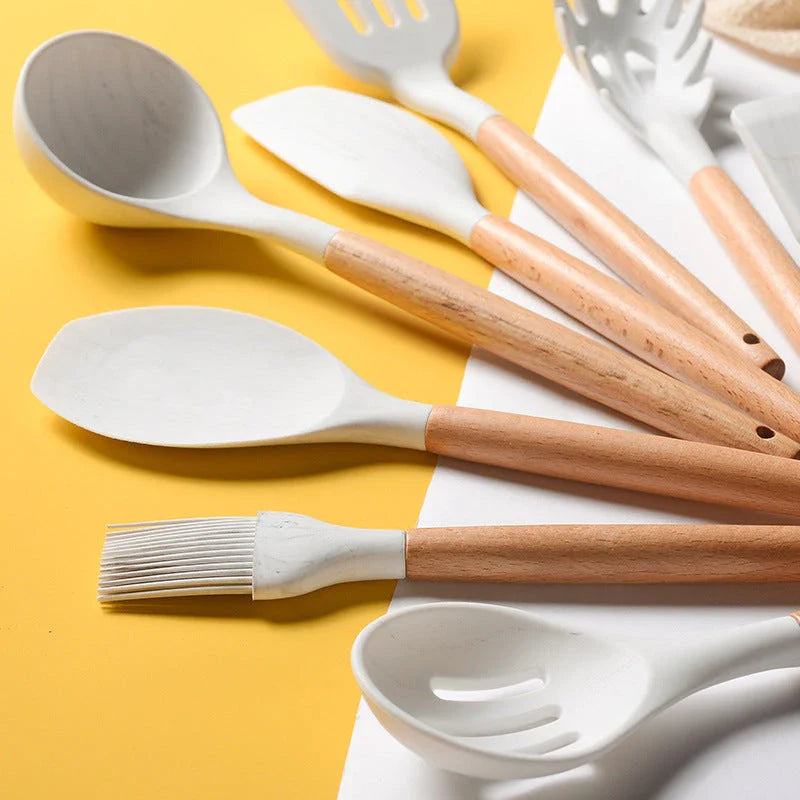 Premium silicone cooking utensil set with marble-patterned wooden handles for a stylish and heat-resistant kitchen accessory