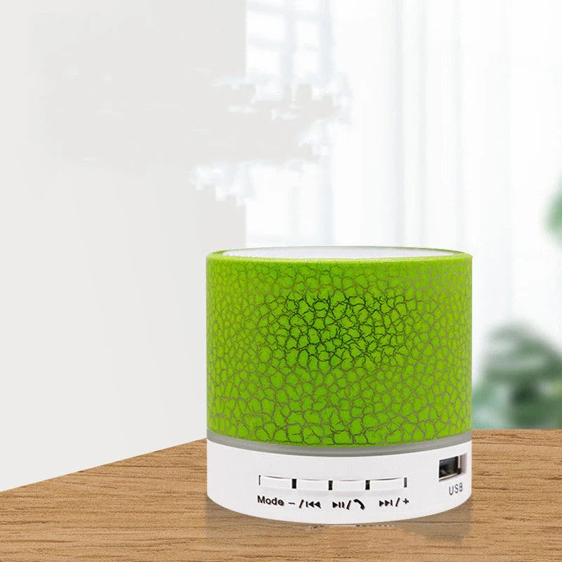 Portable Bluetooth speaker with colorful changing lights, high-quality audio, and durable design for on-the-go use