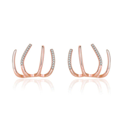 Radiant sterling silver earrings with four-prong zircon stone settings, elegant and fashionable jewelry for women