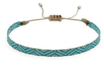 Handcrafted bohemian bracelet with ethnic flair, featuring premium Miyuki DB beads and traditional weaving techniques